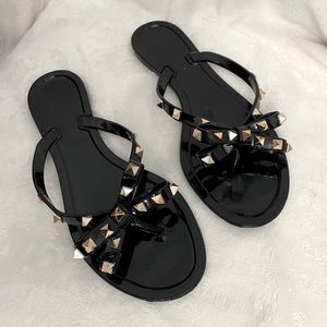 Women’s Size 39 UK (8 US) Black Flat Sandals With Gold Colored Studs.